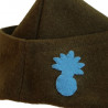 Insigne Grenadier bleu ciel cousu sur un bonnet de Police modèle 1918